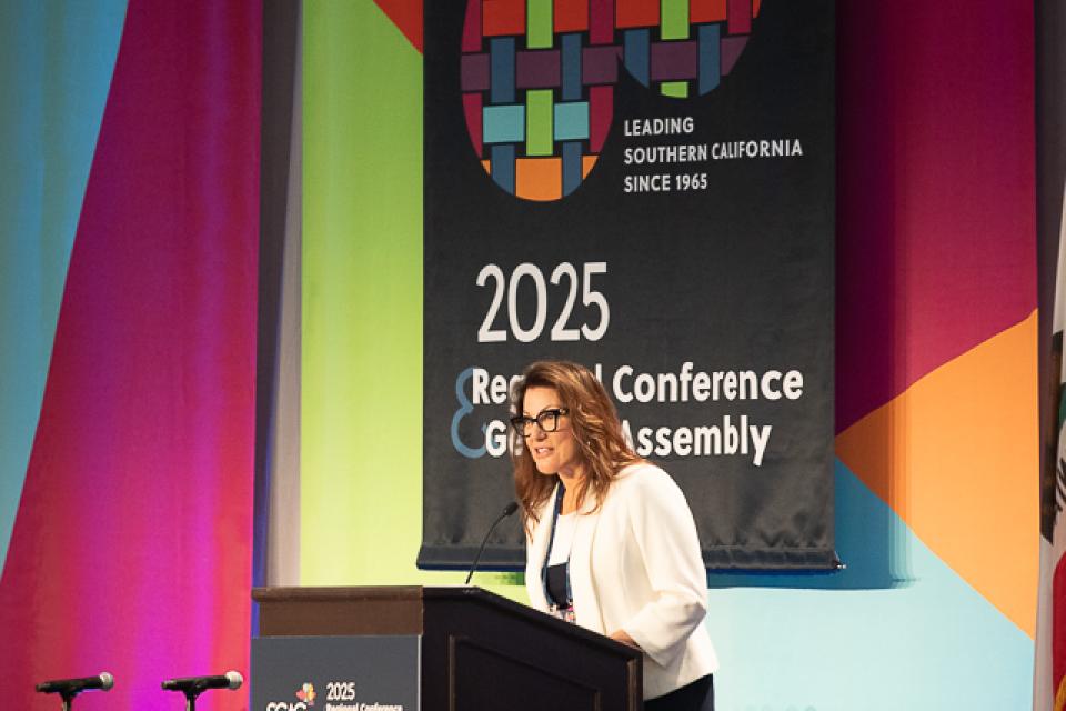 SCAG President Cindy Allen speaking at podium. 