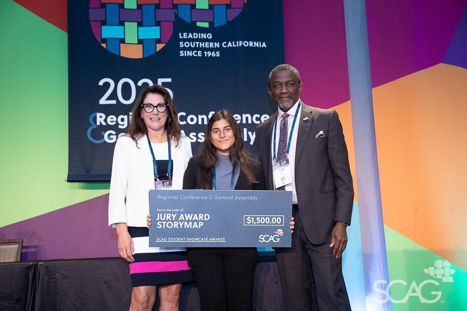 Cindy Allen and Kome Ajise with a Student Showcase winner.