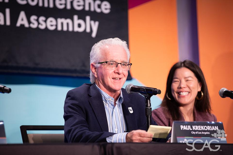 Panelists discussing the 2028 Summer Olympic and Paralympic games.