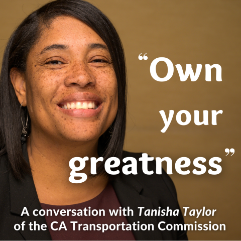 Smiling person with text "Own your greatness."
